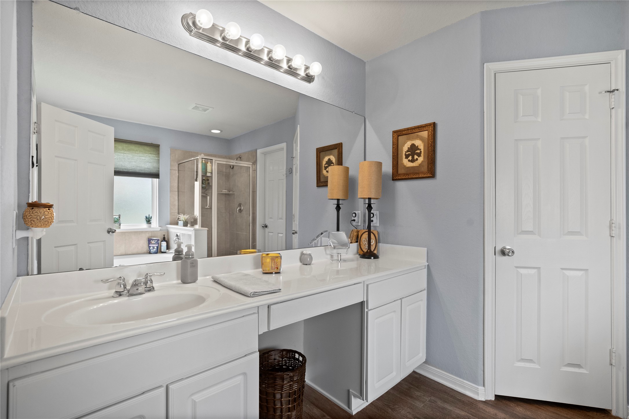 29307 Pear Side Court Spring, TX 77386 - Photo 16 of 29 Primary Oasis! The Primary bathroom offers a vanity area, extra counter space, walk in closet, soaking tub and walk in shower.