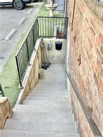 a view of balcony with furniture