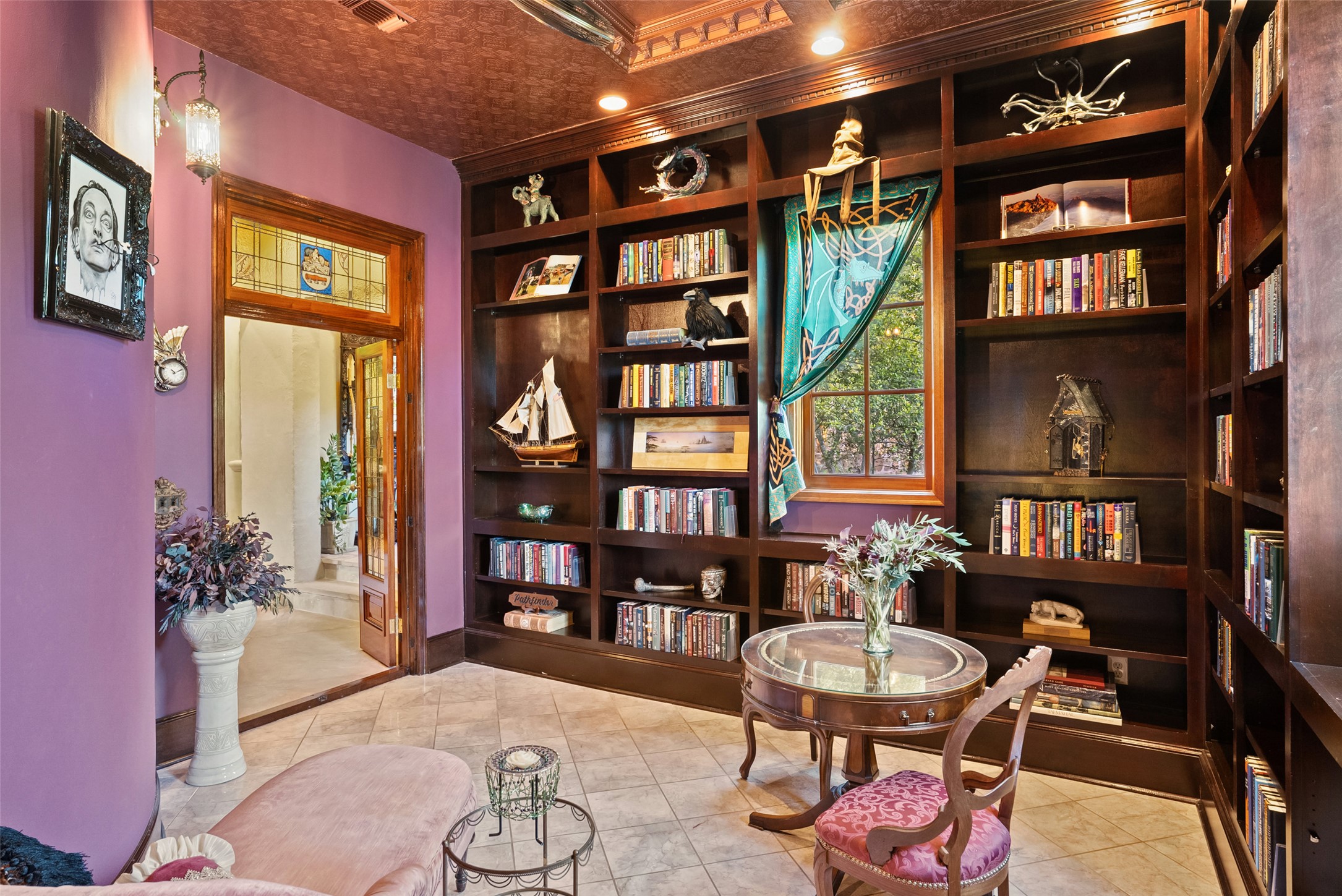 1354 The High Road Austin, TX 78746 - Photo 13 of 40 Custom built-in bookcases provide a perfect space for a home library.