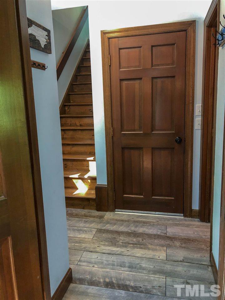 101 Springbrook Place Cary, NC 27518 - Photo 12 of 26 a view of entryway with wooden floor