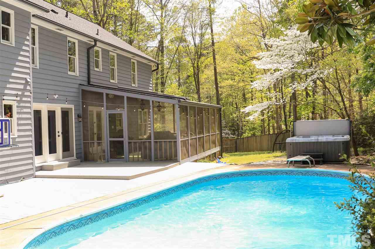 101 Springbrook Place Cary, NC 27518 - Photo 26 of 26 a view of a house with backyard and sitting area