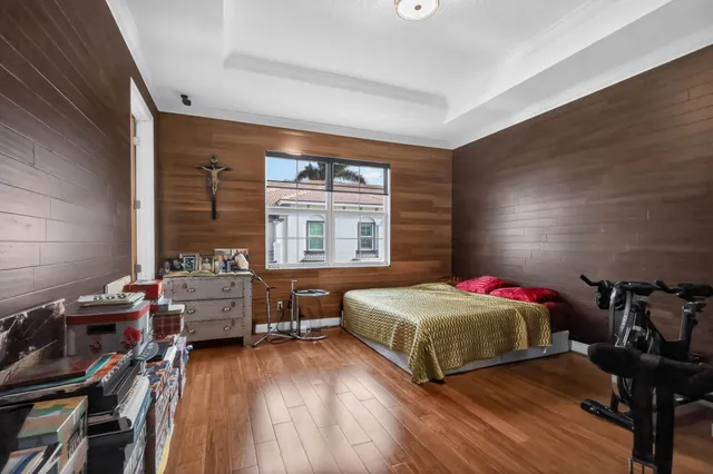 a bedroom with a bed and a table