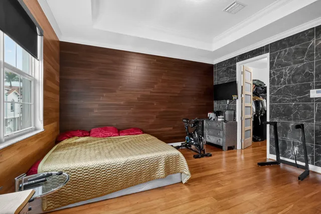 a bathroom with a sink a vanity and a large mirror