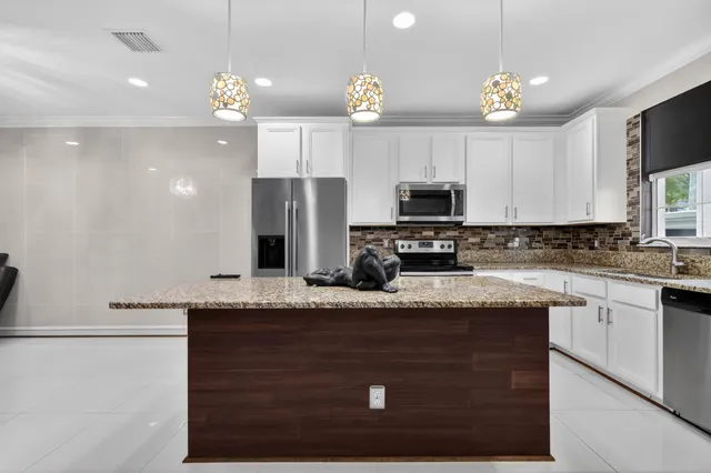 a view of swimming pool with outdoor seating