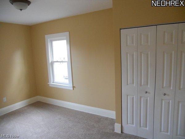 3642 Bainbridge Road Cleveland Heights, OH 44118 - Photo 12 of 25 Really nice bedrooms with all new windows nutral hi-grade carpete light fixtures and refinished woodwork.