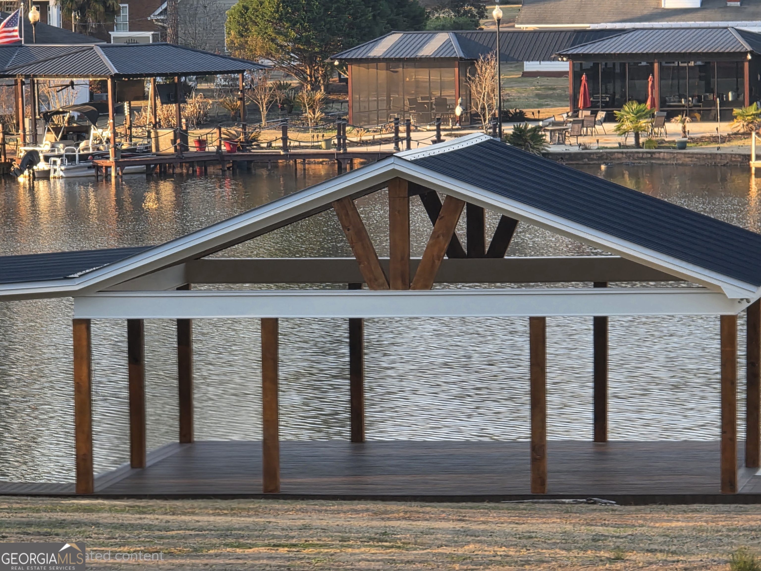 420 Rawley Road Americus, GA 31719 - Photo 5 of 15 a front view of building with lake view