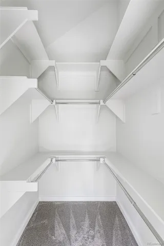 a view of a room with racks on the wall