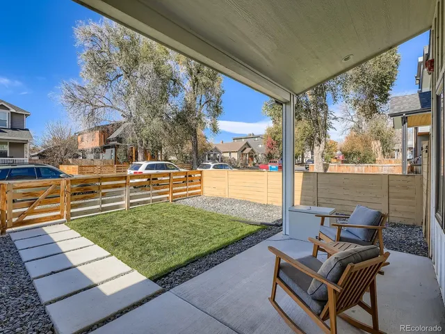 a view of swimming pool with outdoor seating