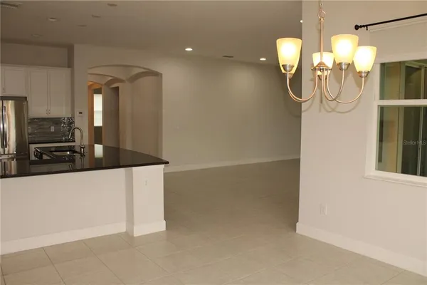 a bathroom with mirror sink and vanity