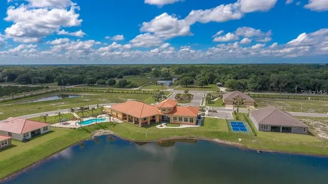 a large living room with large windows