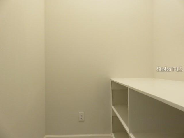 6969 Indus Valley Circle Parrish, FL 34219 - Photo 30 of 49 a view of small space with racks on the wall