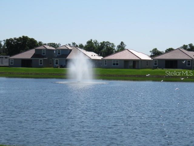 6969 Indus Valley Circle Parrish, FL 34219 - Photo 33 of 49 a front view of a house with garden
