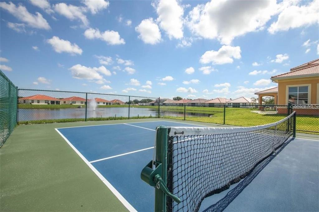 6969 Indus Valley Circle Parrish, FL 34219 - Photo 47 of 49 a view of a tennis court