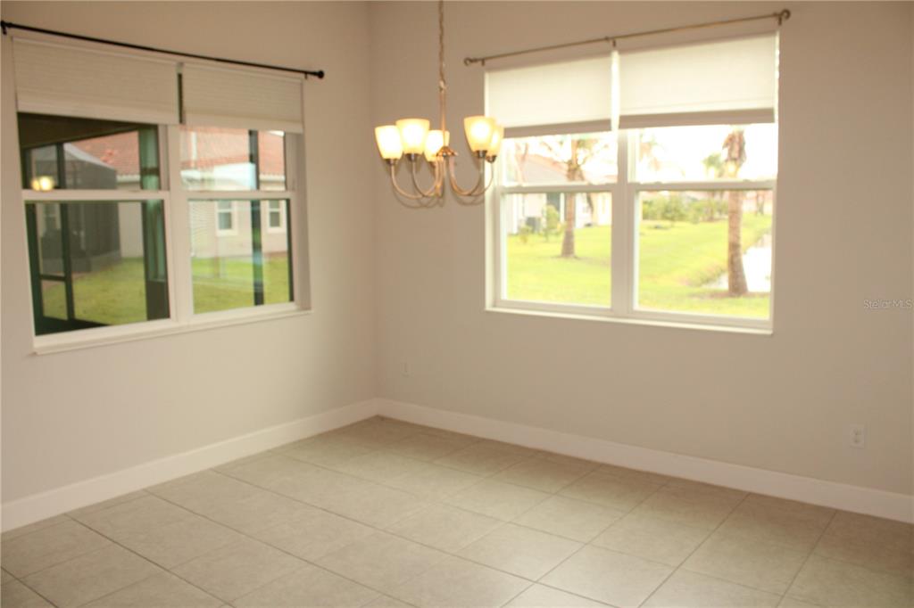 6969 Indus Valley Circle Parrish, FL 34219 - Photo 7 of 49 a view of an empty room with a window