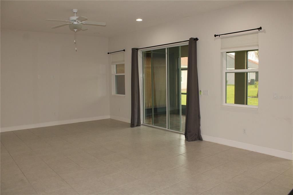 6969 Indus Valley Circle Parrish, FL 34219 - Photo 10 of 49 an empty room with windows and closet