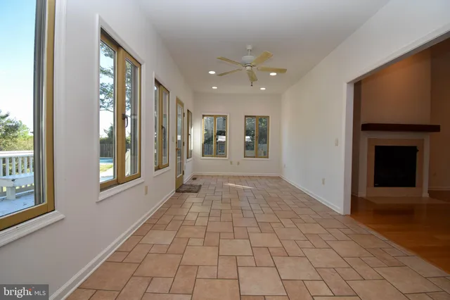 a view of empty room with windows