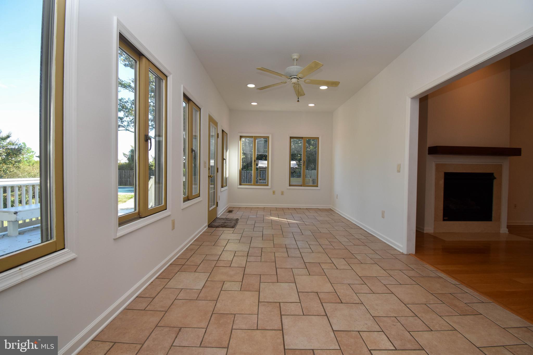 1 Bay Point Road Millsboro, DE 19966 - Photo 13 of 26 a view of empty room with windows