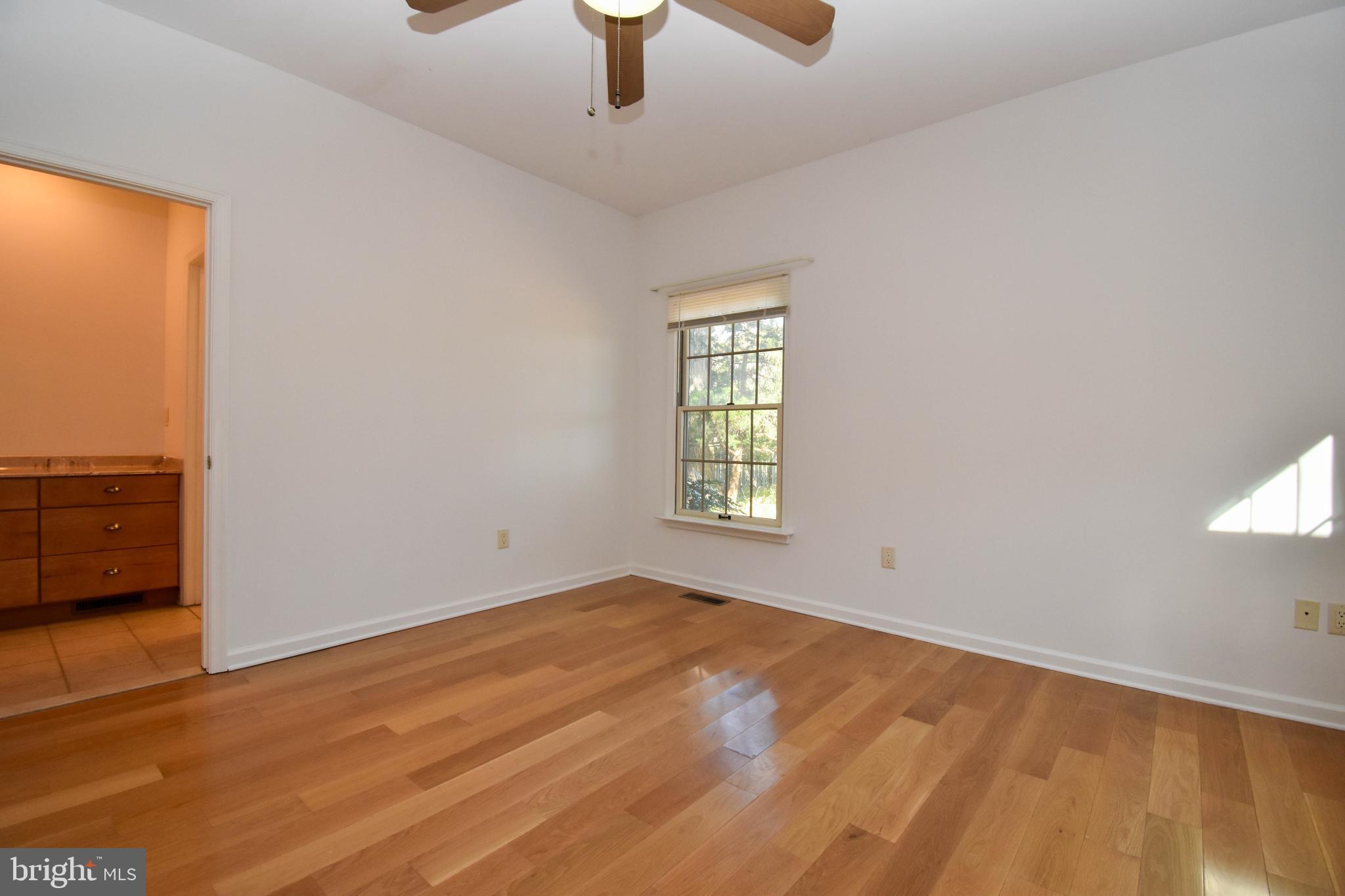 1 Bay Point Road Millsboro, DE 19966 - Photo 15 of 26 an empty room with a window
