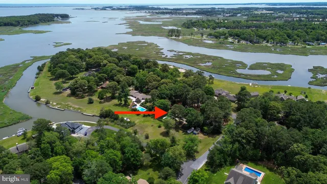 an aerial view of a houses with outdoor space