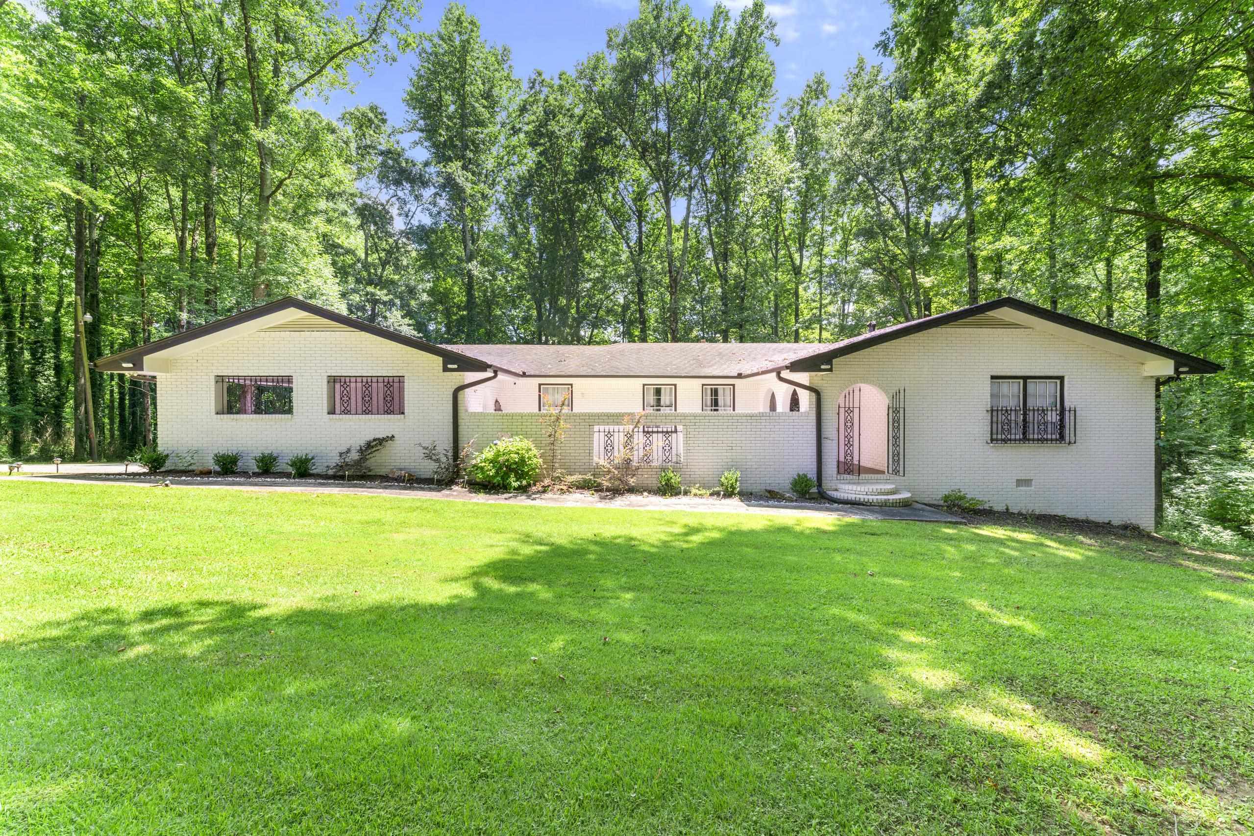 483 Panola Road Ellenwood, GA 30294 - Photo 1 of 1 a view of a house with a yard and fence