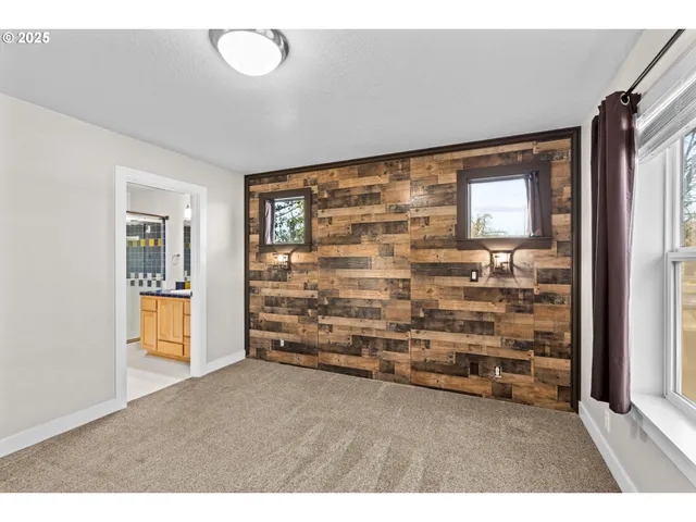a bathroom with a sink double vanity and a mirror