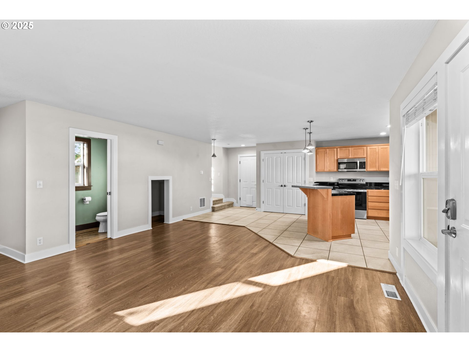 1072 53rd Street Springfield, OR 97478 - Photo 9 of 32 a view of a kitchen with an empty space and a window