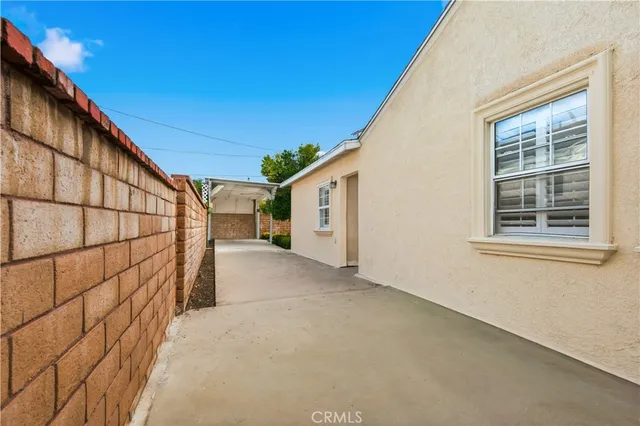 a view of a house with a street