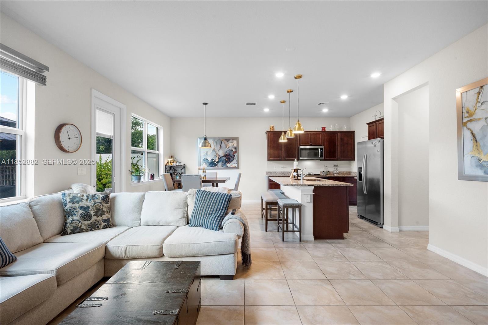 4248 Ficus Street Hollywood, FL 33021 - Photo 12 of 69 a living room with furniture and kitchen view
