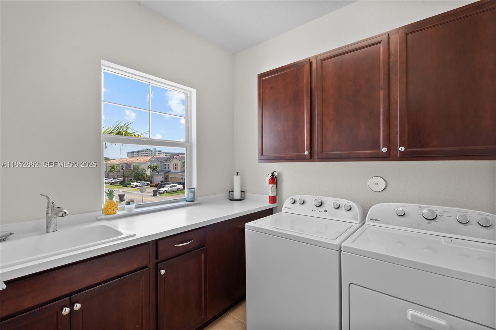 4248 Ficus Street Hollywood, FL 33021 - Photo 27 of 69 a utility room with dryer and washer