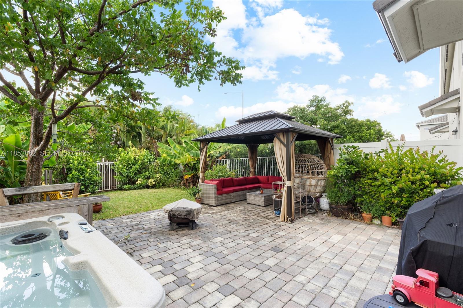 4248 Ficus Street Hollywood, FL 33021 - Photo 40 of 69 an outdoor space with furniture and garden