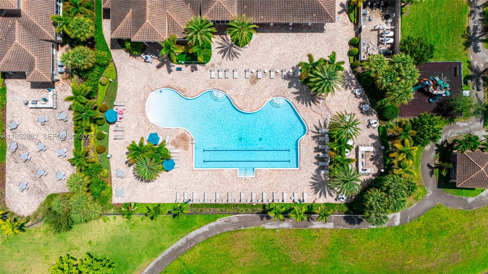 4248 Ficus Street Hollywood, FL 33021 - Photo 68 of 69 an aerial view of a house with a garden and swimming pool