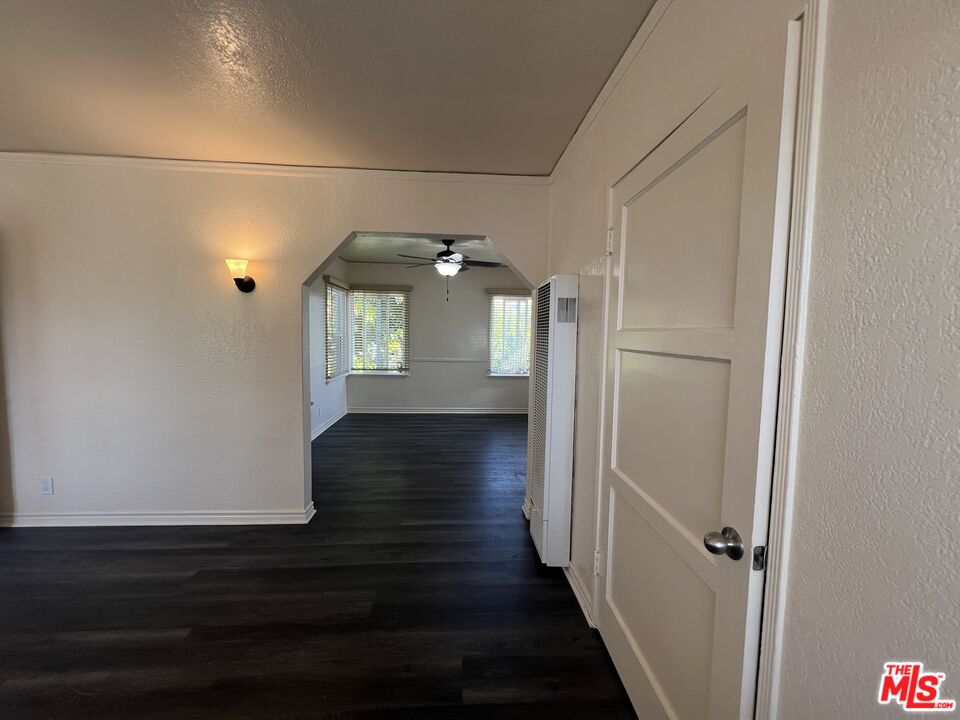 5114 1/2 4th Avenue Los Angeles, CA 90043 - Photo 5 of 23 a view of a hallway with wooden floor