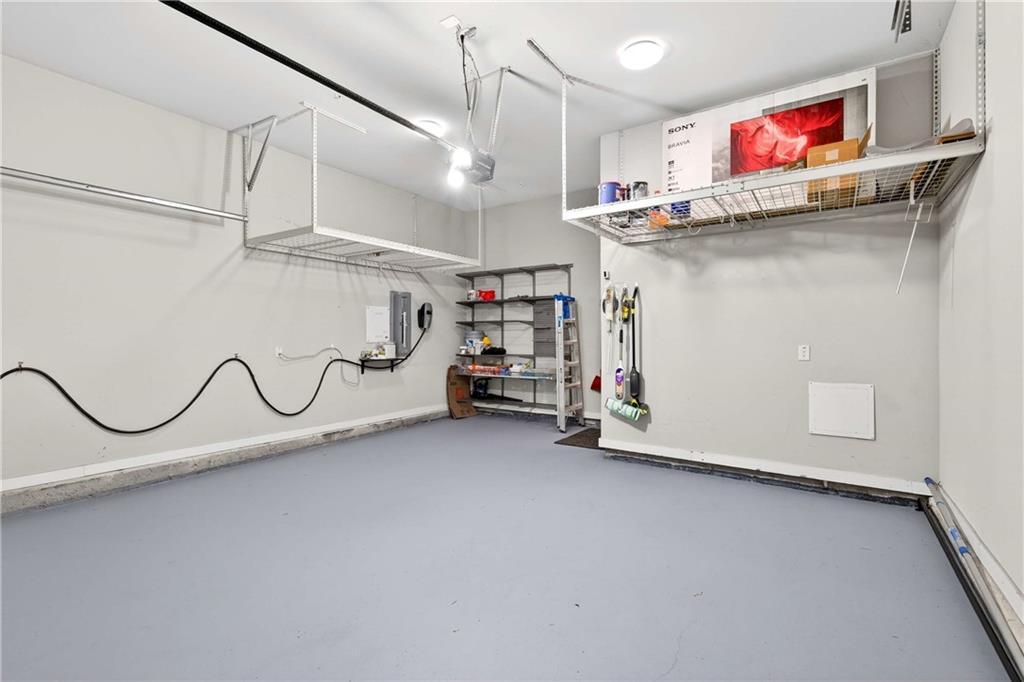 208 Sessions Street Woodstock, GA 30188 - Photo 39 of 47 a view of a room with air conditioner duct and white walls