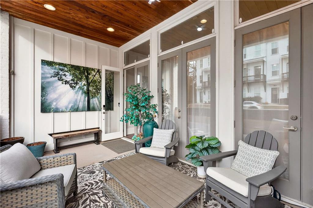 208 Sessions Street Woodstock, GA 30188 - Photo 6 of 47 a living room with furniture and a large window