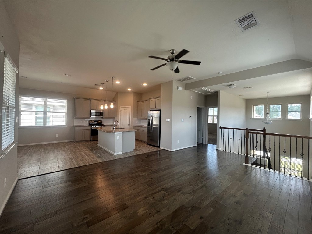 3132 Dunsmore Manor Court Spring, TX 77386 - Photo 15 of 18 a view of empty room with wooden floor and windows