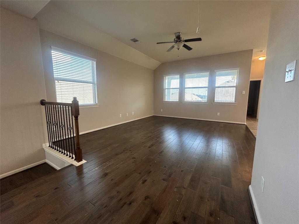 3132 Dunsmore Manor Court Spring, TX 77386 - Photo 8 of 18 an empty room with wooden floor and windows