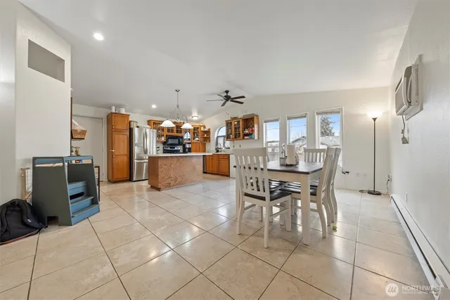 a view of a dining room with furniture