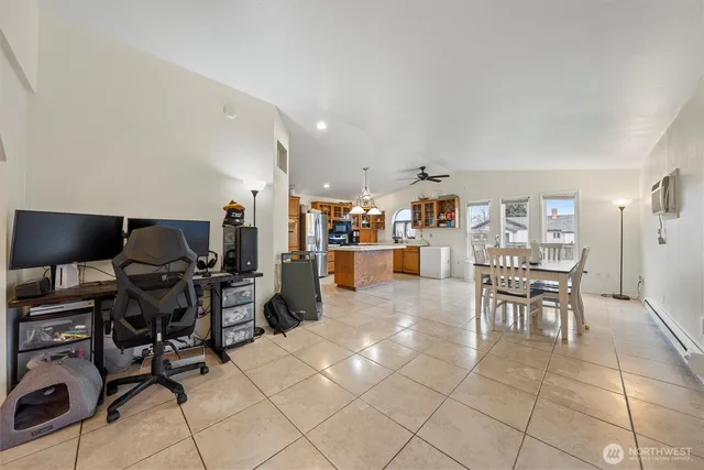 a living room with lots of furniture and appliances