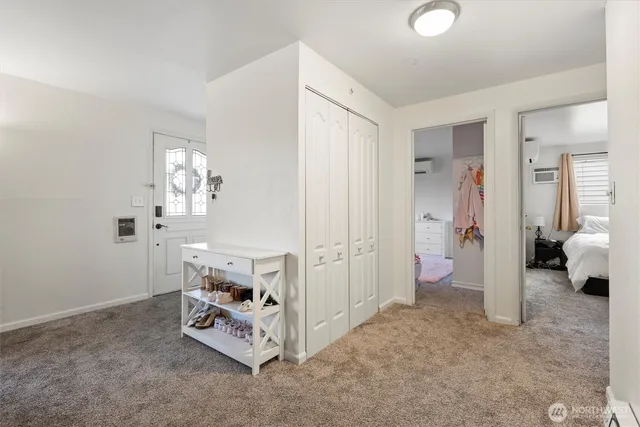 a view of a bedroom with a bedroom