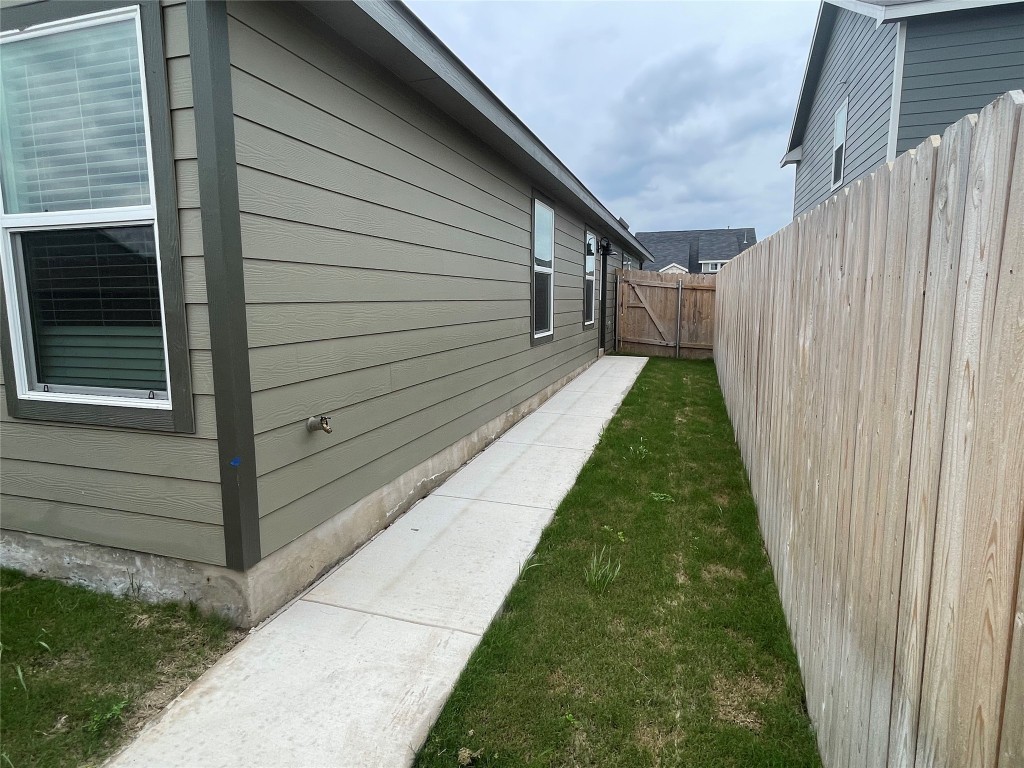 576 Avre Loop Kyle, TX 78640 - Photo 11 of 11 a view of a backyard of the house