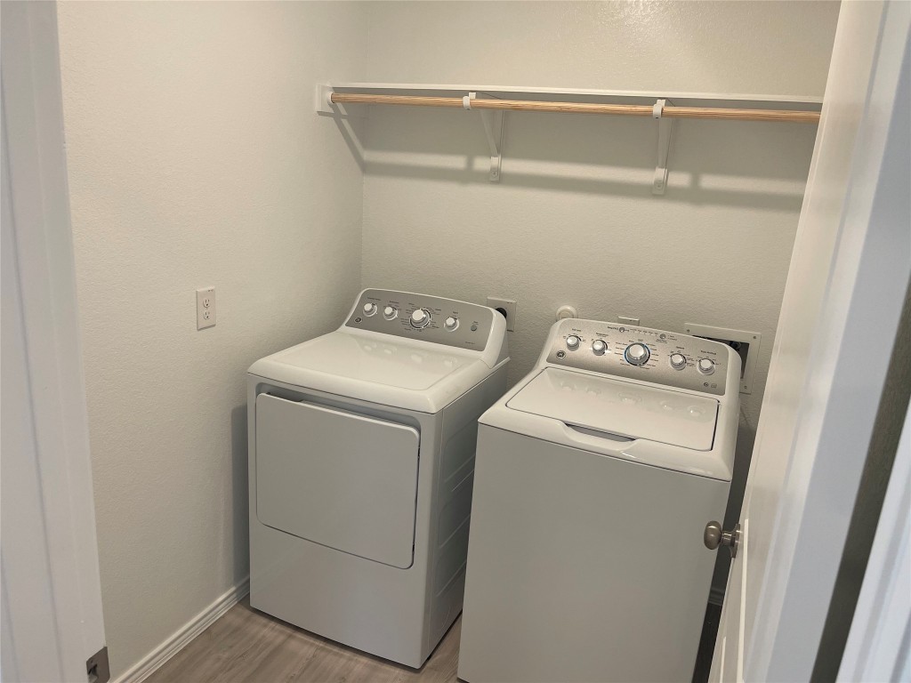 576 Avre Loop Kyle, TX 78640 - Photo 3 of 11 a utility room with dryer and washer