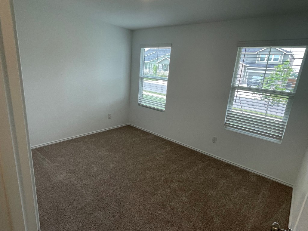 576 Avre Loop Kyle, TX 78640 - Photo 5 of 11 an empty room with a window