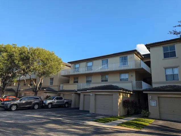 a view of street with parked cars