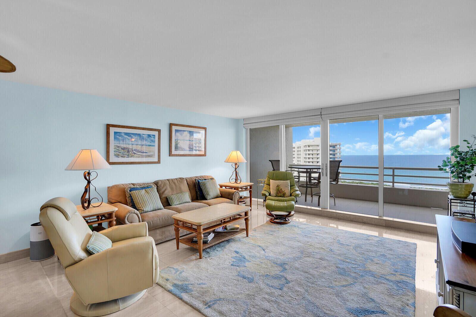 4101 North Ocean Boulevard, Unit 1604 Boca Raton, FL 33431 - Photo 19 of 51 a living room with furniture and a floor to ceiling window