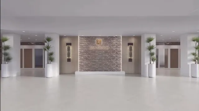 a living room with furniture and a floor to ceiling window