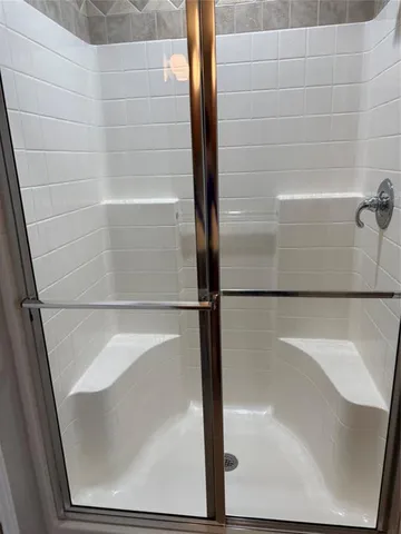 a kitchen with stainless steel appliances granite countertop a sink stove and microwave