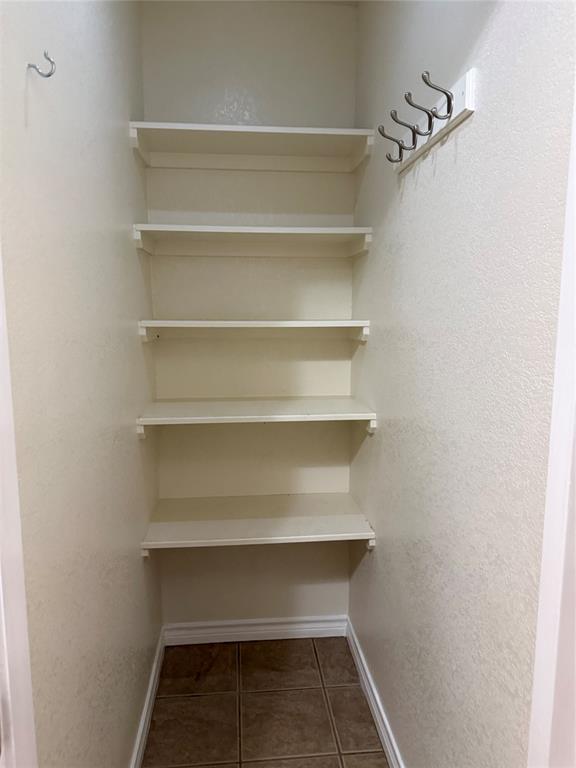 1302 Lewis And Clark Trail Abilene, TX 79602 - Photo 19 of 37 a view of a room with shelf
