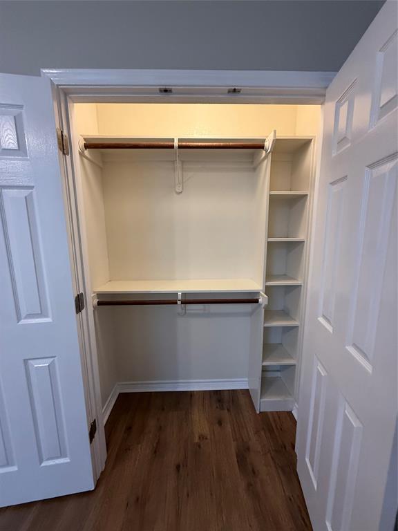 1302 Lewis And Clark Trail Abilene, TX 79602 - Photo 27 of 37 a view of walk in closet with empty racks