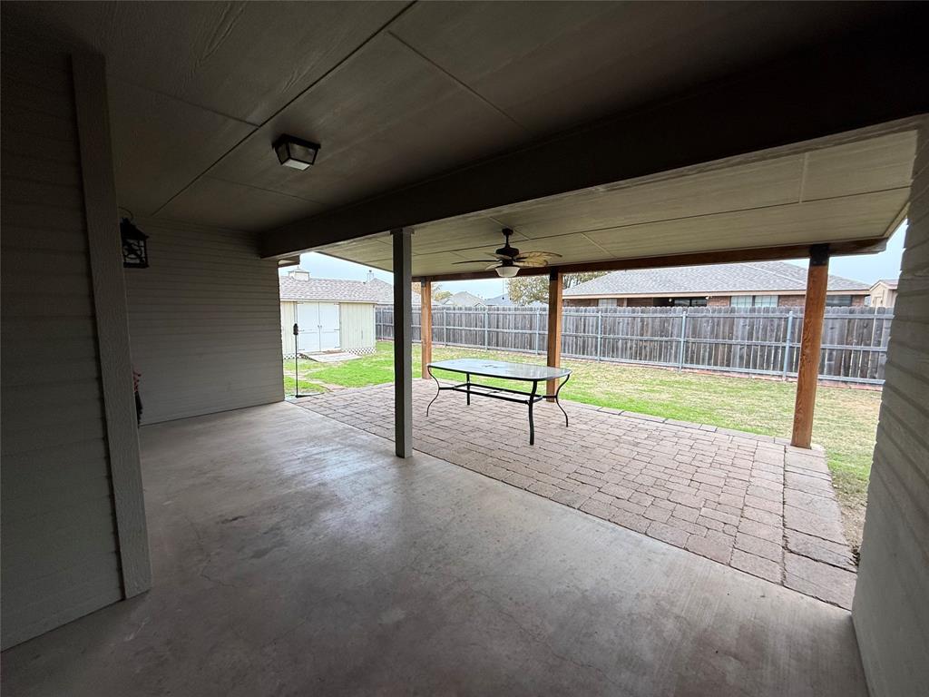 1302 Lewis And Clark Trail Abilene, TX 79602 - Photo 30 of 37 a view of an empty room with a sliding door