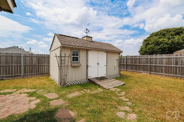 a room with a dresser and a mirror